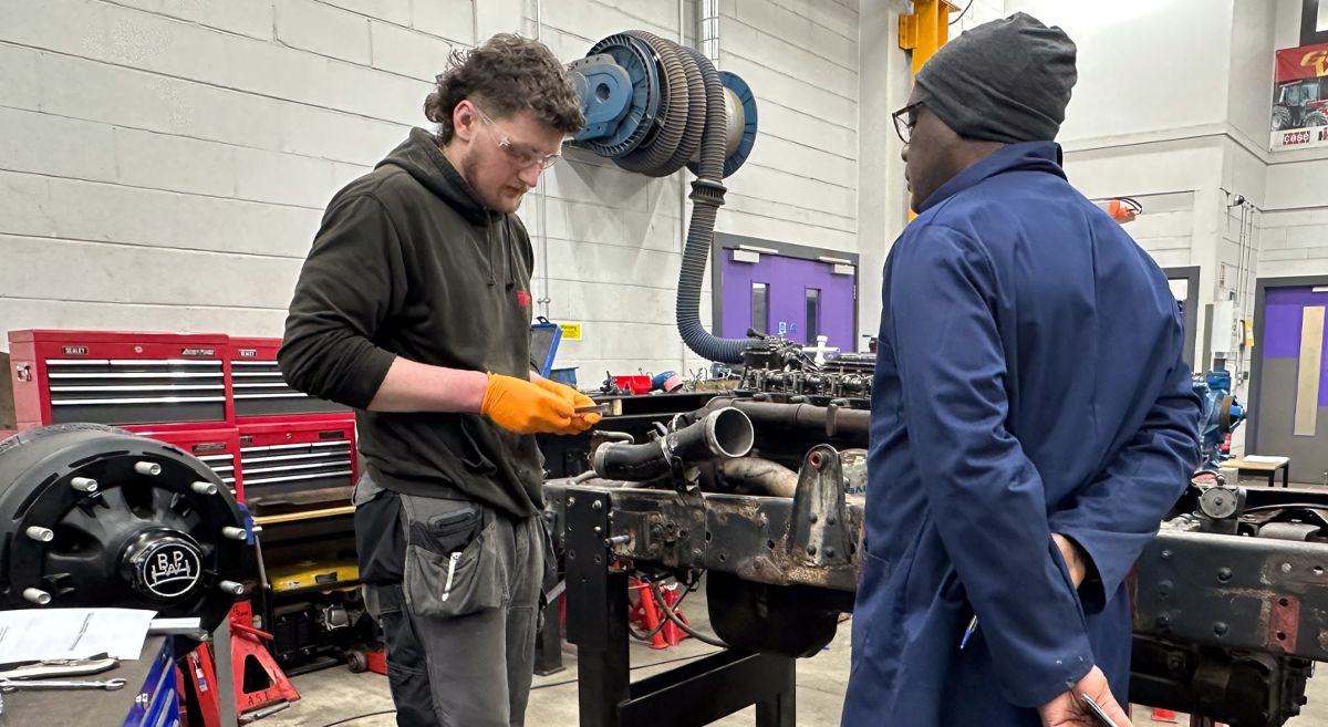 Picture of Construction Plant Maintenance student and teacher