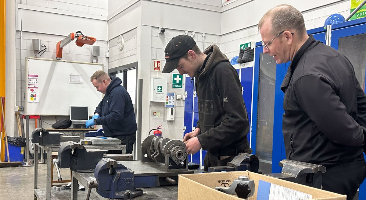 Picture of Construction Plant Maintenance students and teacher