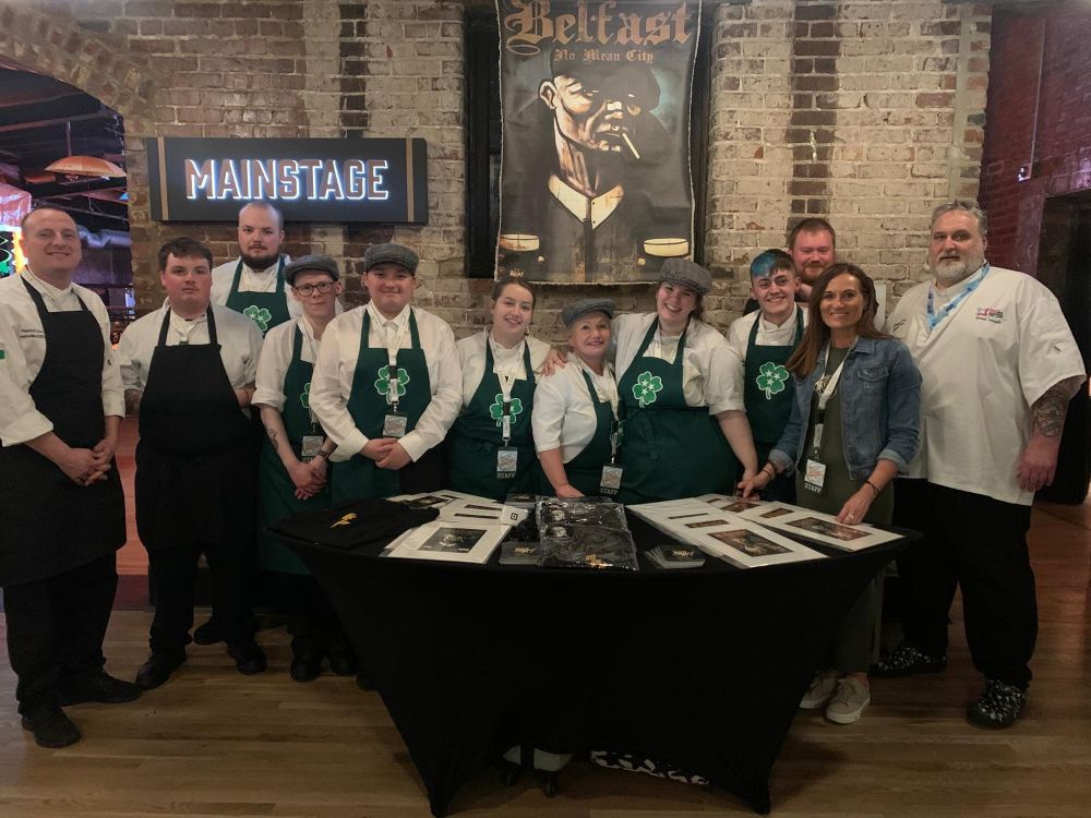 Paul Mercer, Principal Lecturer, SERC with culinary arts students, Liam Murdock, Jordan Stafford, Ethan Hopkins, Levi McShane, Rebekah McMullan, Beverly Patterson, Lucy Boal, Jack Regan and David Rea with Andrea Gowdy, PA, Terry Bradley Art and Brian Magill, Chef Lecturer at the St Patrick’s Day Festival in Nashville.