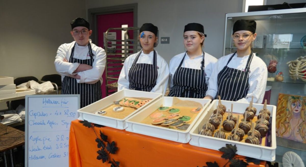 Picture of people at a SERC Halloween Fair stall