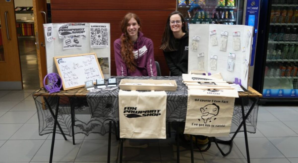 Picture of people at a SERC Halloween Fair stall