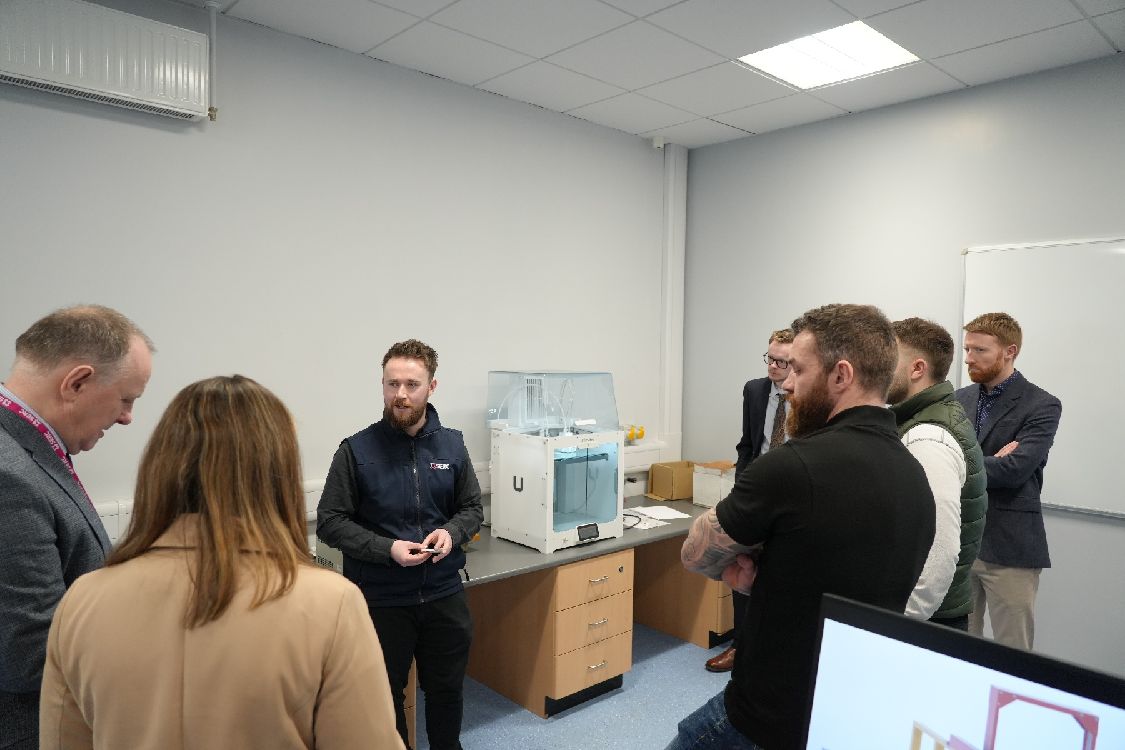 Business Consultant Ryan gives overview of the facilities to guests