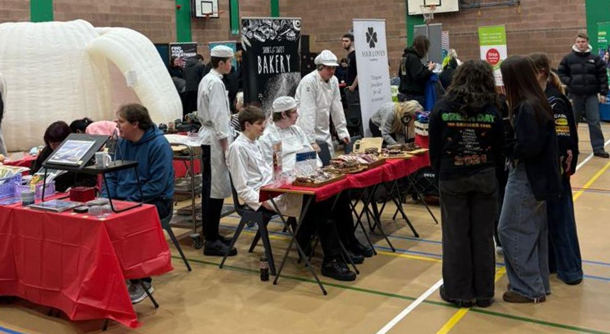 Picture of staff and students at a love your college event