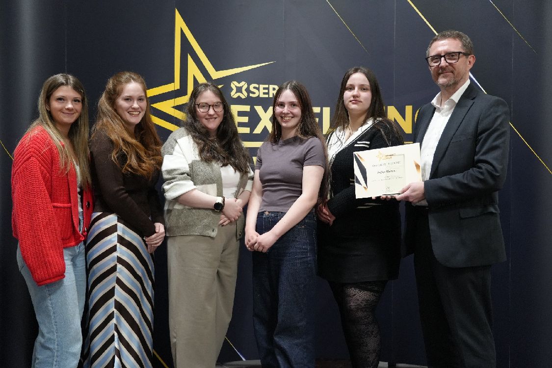 Nikitta McMullan (Downpatrick), Grace Clingen (Ballynahinch), Rose O’Hare (Dromara), Emma Miskelly (Comber), Lauren Black (Castlewellan), Saoirse Carson (Killyleagh) and Tia Smyth (Killinchy) with Tommy Martin