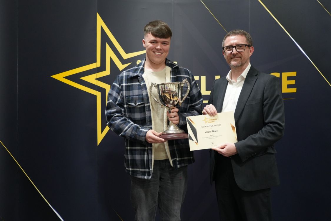 Daniel Mahon receives the Boden Cup from Tommy Martin
