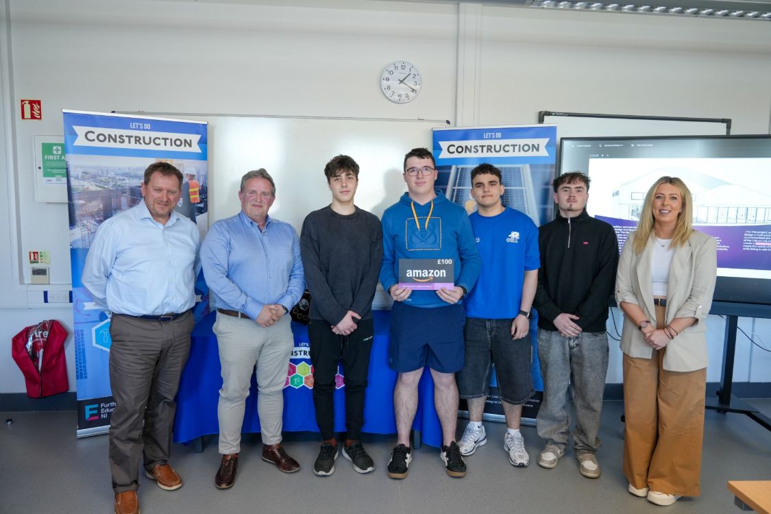 Picture of second place engineering group with judges