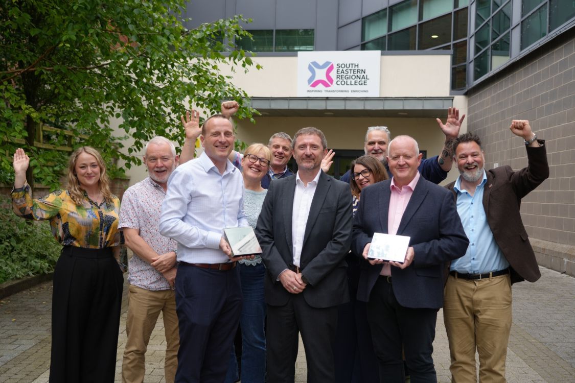 Picture of SERC Staff celebrating two silver awards