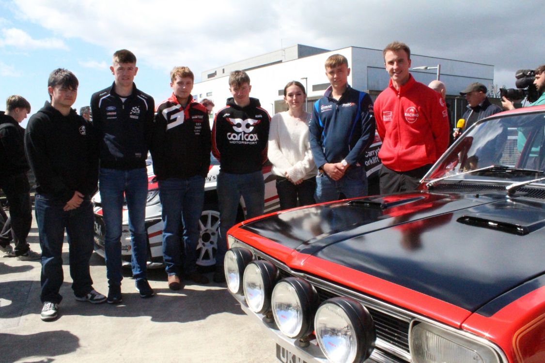 SERC students with rally driver Jonny Greer and cars