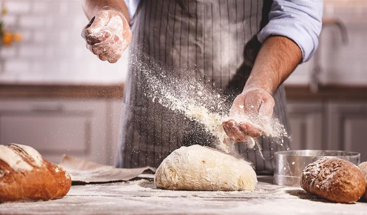 Person making bread