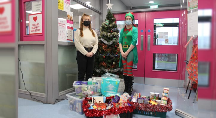 SERC Staff and Student with donated items