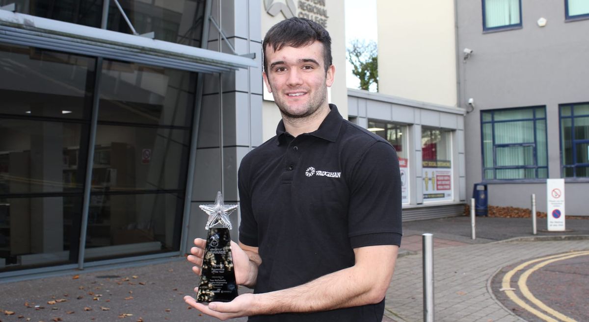 Picture of Troy McConville holding his Electrical Apprentice of the Year award